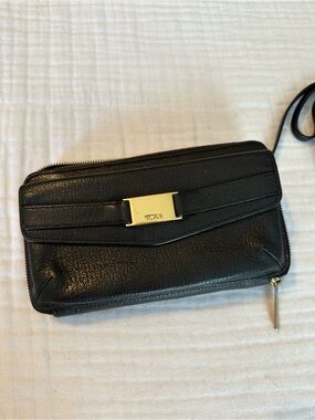 Tumi Black Leather crossbody Wallet with Gold Hardware